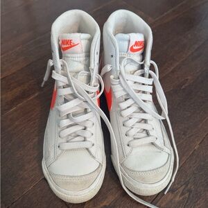 Nike White High-Tops with Bright Orange Accents